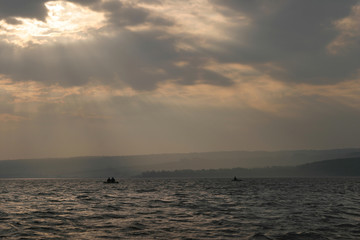 dramatic clouds over the water