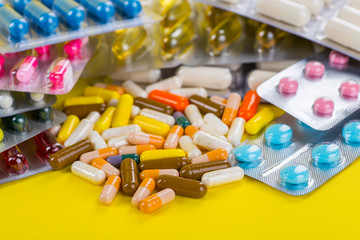 Selection of different pills in form of tablets and capsules