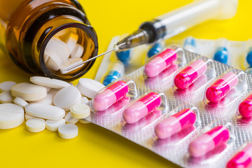 Selection of different pills in form of tablets and capsules