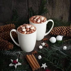 Door stickers Chocolate Hot chocolate with marshmallows spices on the old wooden background. Coffee, cocoa, cinnamon, star anise, cozy and christmas tree branches. Christmas Still Life