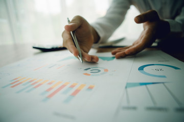 businessman hand working with new modern computer and business strategy as concept,selective focus
