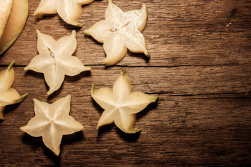 carambola on wood background 