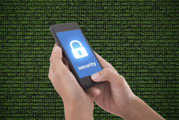 Hand holding mobile phone with concept technology security system on mobile.