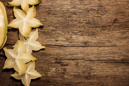 carambola on wood background 