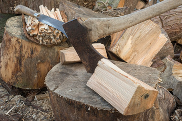 Hatchet by Chunks of Firewood