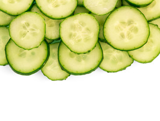 Cucumbers sliced into slices isolated on white.