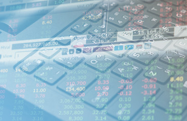 finance data on keyboard computer and graph business concept canuse for background