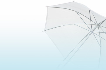 Raindrop on white umbrella