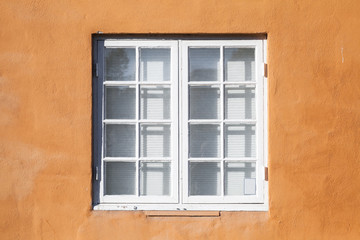 Fototapeta na wymiar Square window in white wooden frame