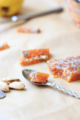 Pieces of quince jam. Delicious paste.