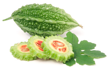 Naklejka na ściany i meble green bitter melon or momordica with leaf isolated on white background