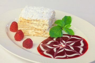 Napoleon cake with raspberries and strawberries, blueberries