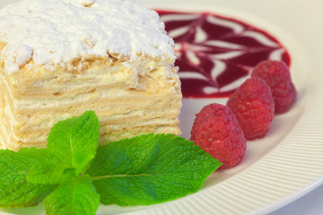 Napoleon cake with raspberries and strawberries, blueberries