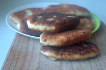 Several fried patties on a plate close-up.