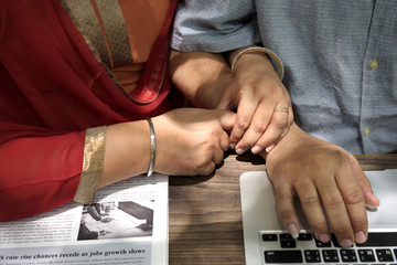 Indian Couple Using Device Concept