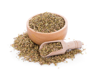 Dried Oregano on wooden bowl  on white background