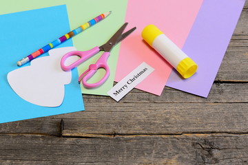 Christmas card tutorial. Step. Kids art. Tree pattern, colored paper sheets, scissors, glue stick,...