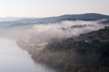 Foggy hills and river
