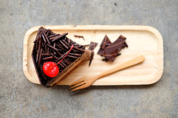 chocolate cake on wood table.