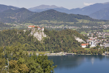 Fototapeta na wymiar Castle and St. Martins Church overlooking Bled Lake in Slovenia.
