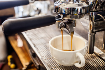 Cup of coffee latte in coffee shop 