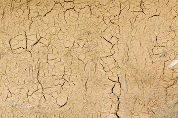 Close up of the clay wall of the  adobe house