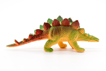Stegosaurus toy model on white background © Noey smiley