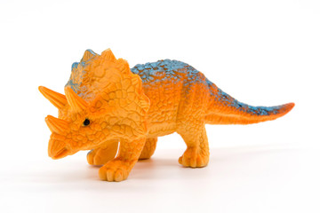 Triceratops toy model on white background