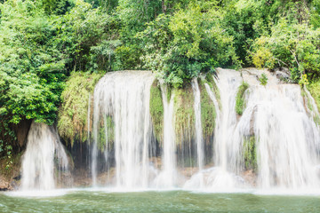 Fototapeta na wymiar Sai Yok waterfall, the beautiful waterfall in forest at Sai Yok National Park - A beautiful waterfall on the River Kwai. Kanchanaburi, Thailand