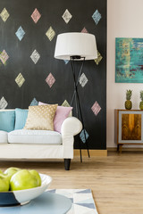 Living room with black wall