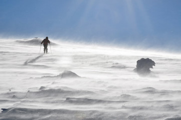 Fototapeta na wymiar Backcountry skier touring in beautiful winter mountains