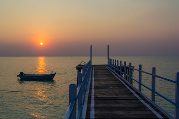 Obraz premium Tramonto sul molo