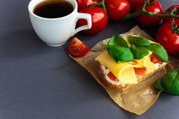 Bruschetta with spinach and cherry tomatoes on toasted baguette