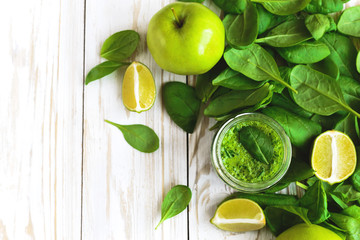 Healthy green smoothie with spinach, lime and apple