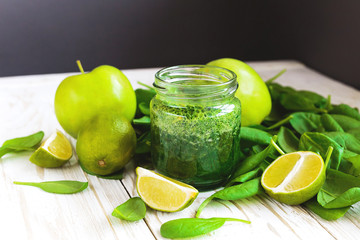 Healthy green smoothie with spinach, lime and apple