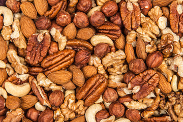 Mix of different nuts closeup photo