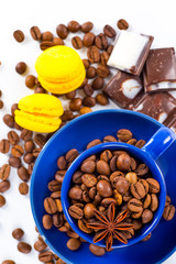 Coffee cup and beans on a white background.