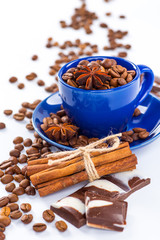 Coffee cup and beans on a white background.