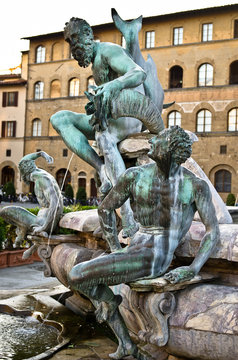 Bronze statues of the fountain Neptune in Florence
