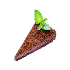 Delicious dark chocolate cake with cream and green mint isolated on a white background. Sweet tasty food, coffee break concept.