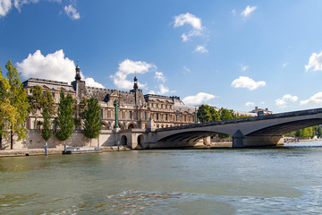 Fototapeta premium PARIS, FRANCE, april 25. Carousel Bridge (pont du Carrousel). Join the Quai Malaquais with the Louvre Museum and the Place du Carrousel. View from the river Seine