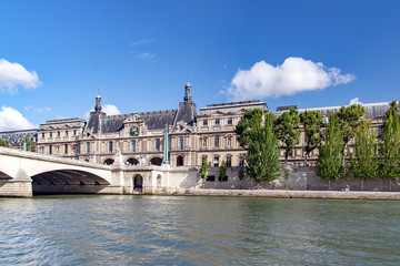 Fototapeta na wymiar PARIS, FRANCE, april 25. Carousel Bridge (pont du Carrousel). Join the Quai Malaquais with the Louvre Museum and the Place du Carrousel. View from the river Seine