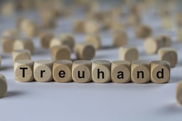 Treuhand - Holzwürfel mit Buchstaben
