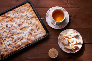apple pie charlotte on the wooden table