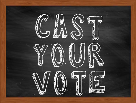 CAST YOUR VOTE handwritten text on black chalkboard
