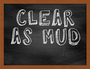 CLEAR AS MUD handwritten text on black chalkboard