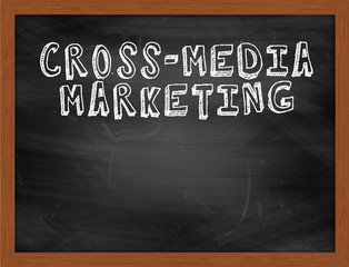 CROSSMEDIA MARKETING handwritten text on black chalkboard