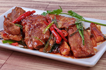 Close up of grilled chili  pork spare ribs curry.  Selective foc