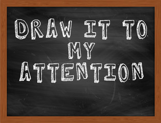 DRAW IT TO MY ATTENTION handwritten text on black chalkboard