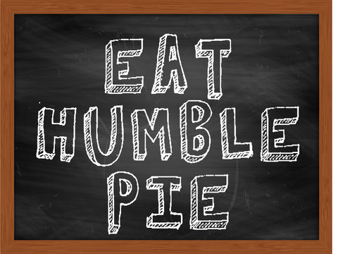 EAT HUMBLE PIE handwritten text on black chalkboard